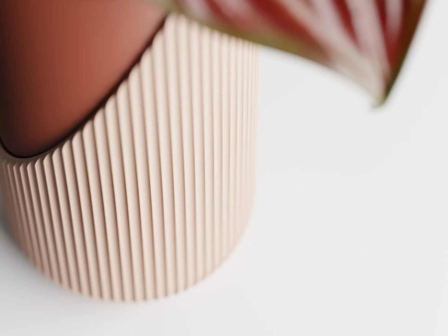 Encastra – Layers of beauty. Depth of style Flower Pot