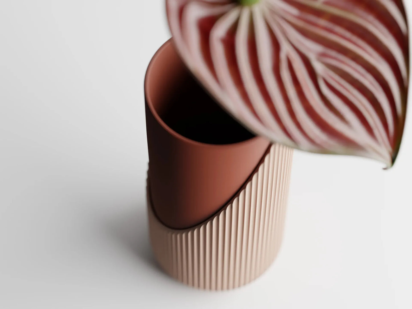 Encastra – Layers of beauty. Depth of style Flower Pot
